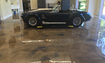 Floor, Flooring, Automobile repair shop, Classic car, Hubcap